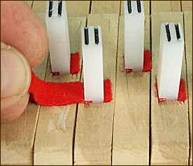 Making shoulder-style balance rail bushings using the shoulder side of the caul